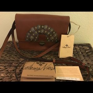 Patricia Nash luxe leather messenger/wristlet
